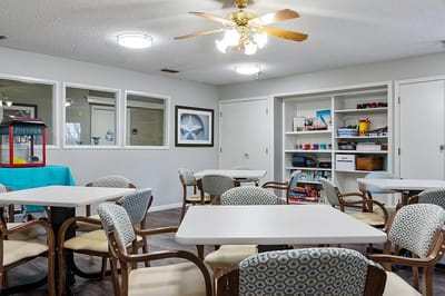 Common area with seating and bookshelves