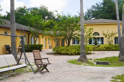 Outdoor courtyard with seating and landscape
