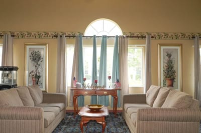Common area with couches and decorative elements