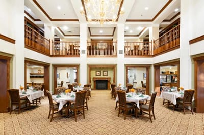 Interior view of a dining room with tables and decor
