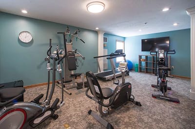 Fitness room with exercise equipment