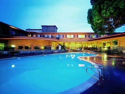 Outdoor pool area of the facility at dusk