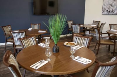 Dining area with tables and meals set up