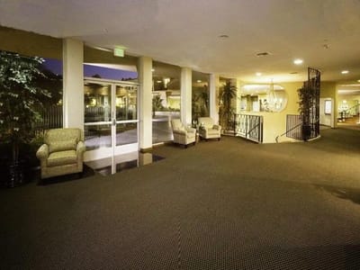 Interior lobby area with seating and plants