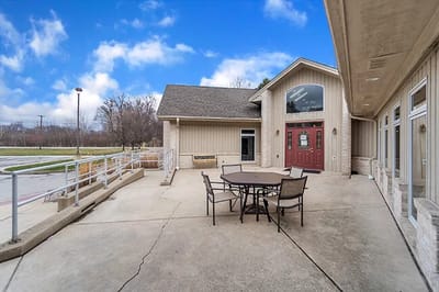 Outdoor patio area next to facility building