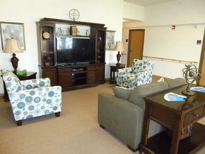 Common area with seating and television