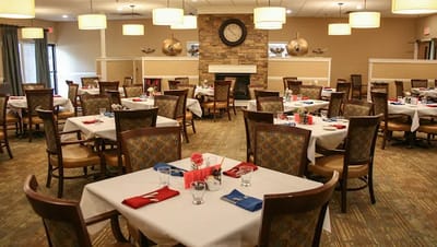 Dining area with tables set for a meal