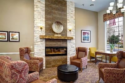 Cozy common area with seating and a fireplace
