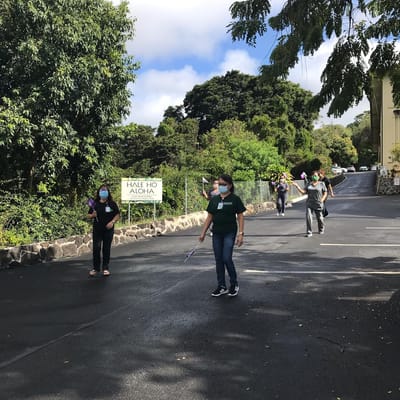 Staff and residents participating in an outdoor activity