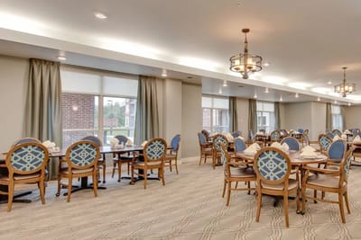 Bright dining area with tables and chairs