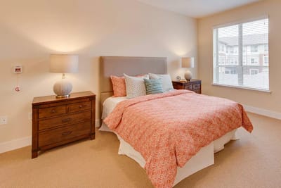 Bright and inviting bedroom in a senior living facility
