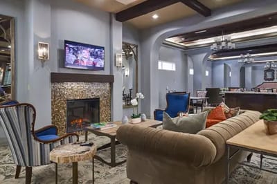 Interior lounge area with comfortable seating and a television