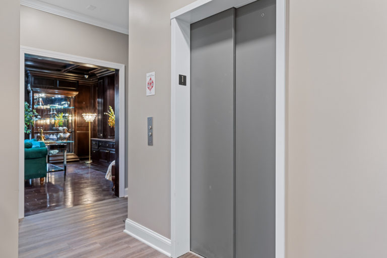 Elevator in a hallway of a senior living facility