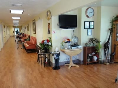 Interior view of a hallway with seating and decorations