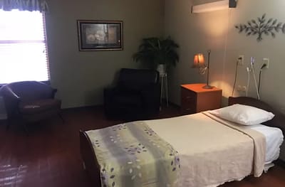Simple interior of a resident room with basic furnishings
