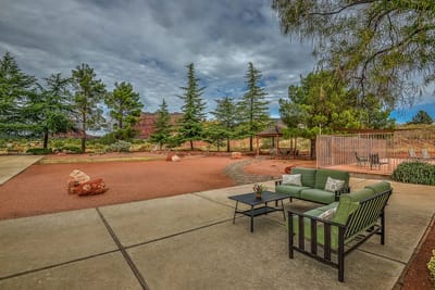 Well-maintained outdoor space with seating and landscaping