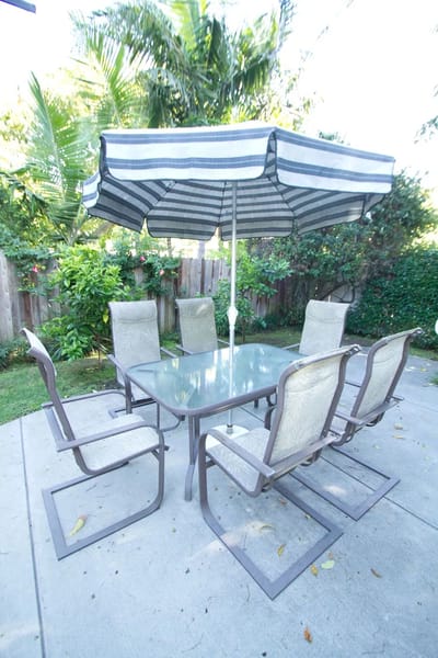 Outdoor patio seating area with an umbrella