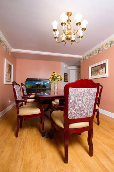 Elegant dining room setup with a chandelier