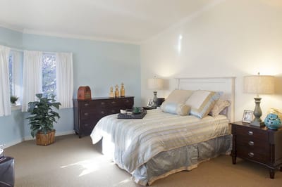 Bright interior of a well-furnished bedroom