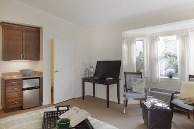 Well-furnished private resident room with kitchenette