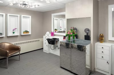 Interior hair salon area with styling stations