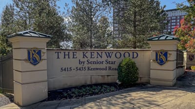 Entrance sign for The Kenwood by Senior Star