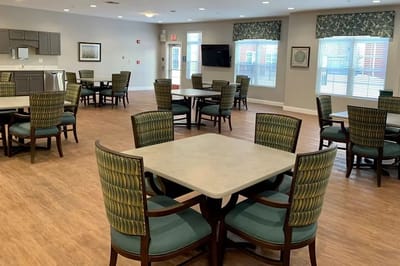 Bright dining area with tables and chairs