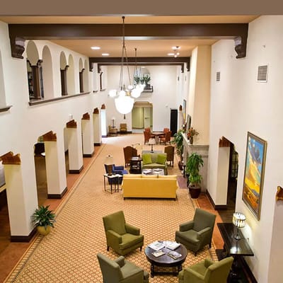 Interior view of a well-lit common area with seating