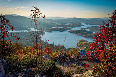 Scenic view of a lake surrounded by autumn foliage