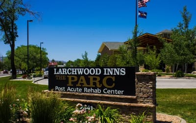 Exterior view of Larchwood Inns facility sign