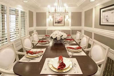Elegant dining room setup with floral centerpiece