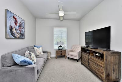 Cozy living room with a couch and television