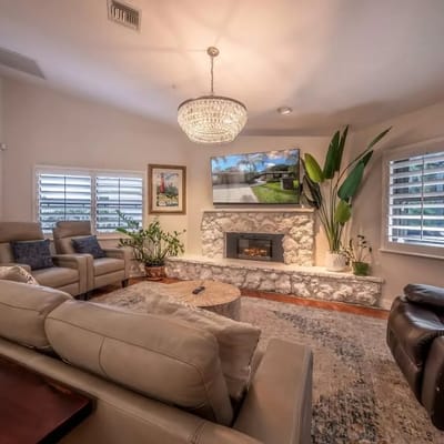 Cozy common area with comfortable seating and a fireplace