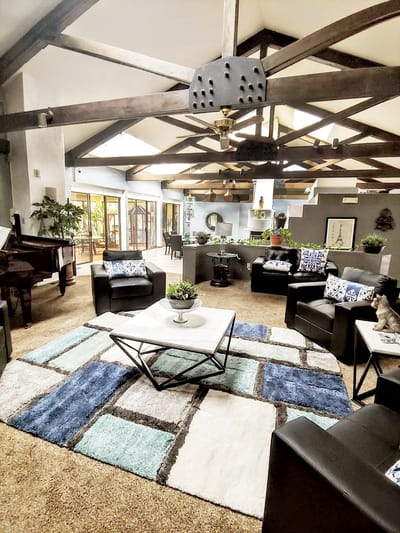 Cozy common area with seating and plants