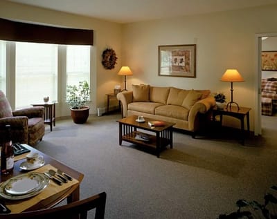 Cozy living room with comfortable furniture and warm lighting