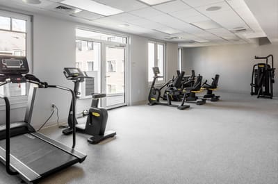 Interior view of a fitness area with equipment