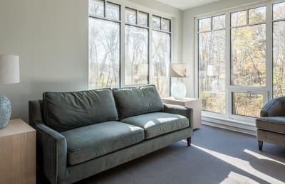Bright, airy lounge area with large windows