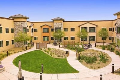 Outdoor courtyard with landscaped gardens