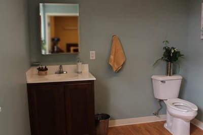 A clean, well-lit bathroom in a senior living facility
