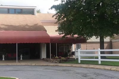 Exterior view of the facility entrance with awning