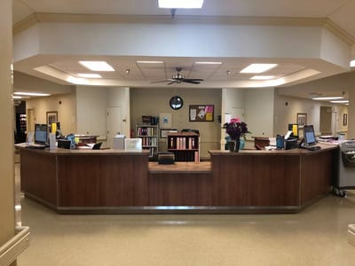 Reception area of a senior care facility with a warm atmosphere