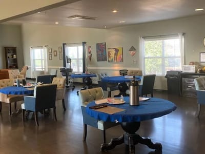 Bright dining area with tables and chairs