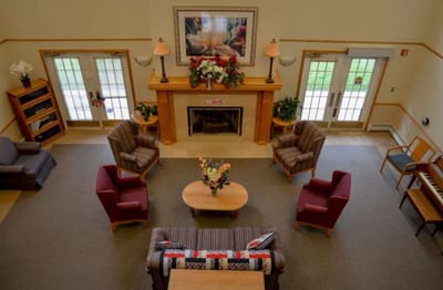 Common area with seating and a fireplace