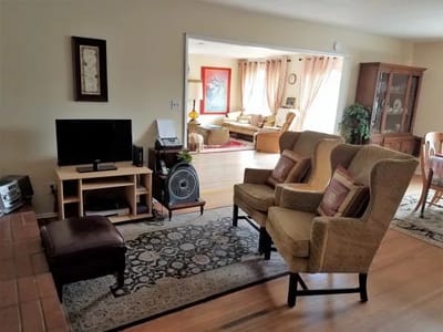 Cozy common area with seating and a living room view