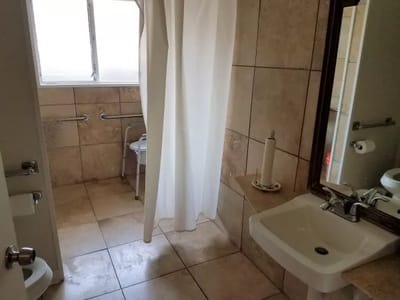Clean and accessible bathroom with safety features