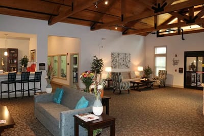 Bright common area with seating and decor
