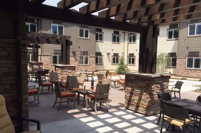 Outdoor courtyard with seating and landscaping