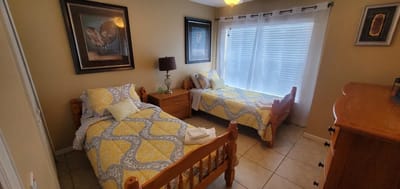 Interior view of a shared resident bedroom with two beds
