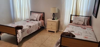 A neatly arranged double bedroom in the facility