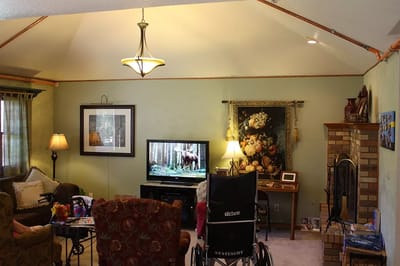 Interior common area with seating and TV